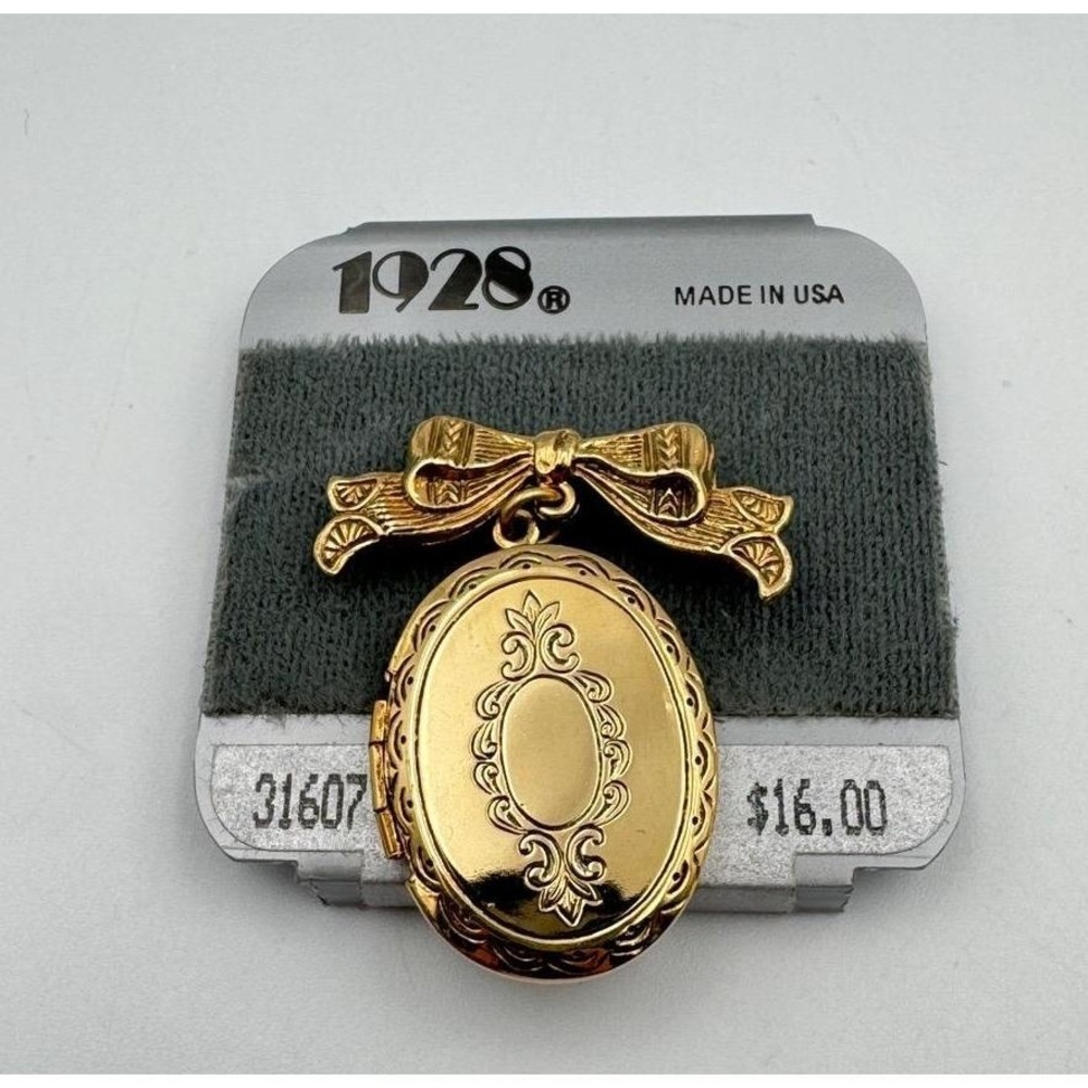 Vintage 1928 Gold Tone Dangle Locket Bow Brooch Pin New Old Stock